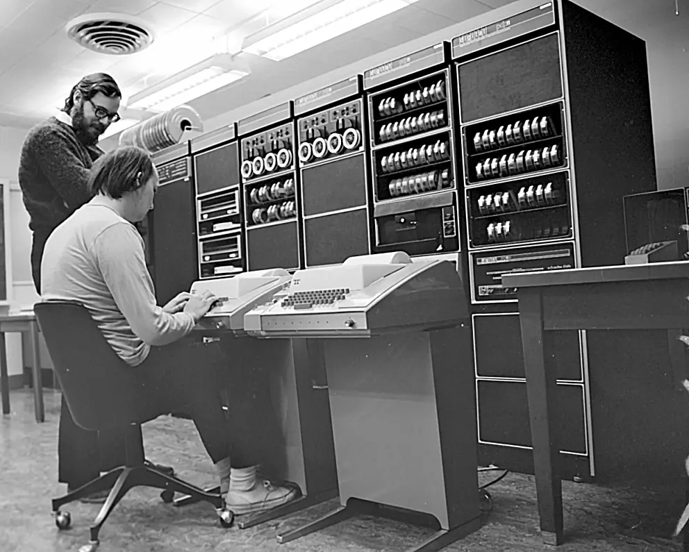 Ken Thompson (seated) and Dennis Ritchie at Bell Labs, circa 1970, in front of a PDP-11.